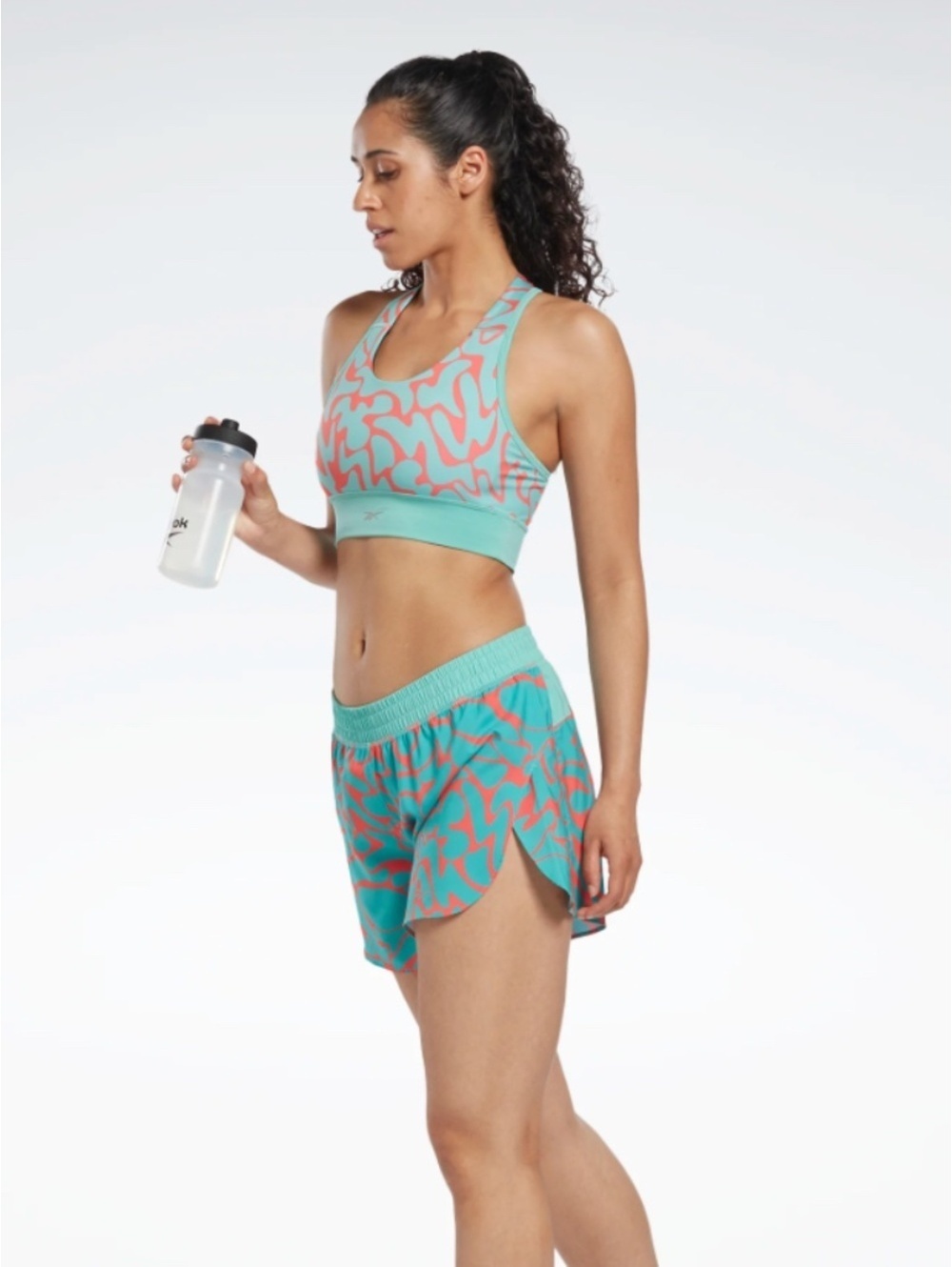 Reebok Running Shorts Abstract Bright Coral and Teal Print, Size S/M